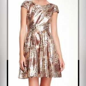 Betsey Johnson metallic sequined fit and flare dress with a leopard print,Size 4